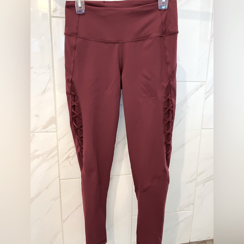 Victoria Sport full length legging with side details.  Like new, size M. Maroon